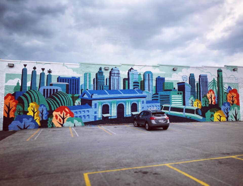 amjodo's tweet photo. Super proud of my hubby Dave Douglass, who designed this beautiful mural that is now a fixture on the new @SpiraCare building in the Crossroads, commissioned by @barkleyus. Amazing work from the whole team and love seeing Dave’s art on such a huge display! https://t.co/OswYoWY7Qe