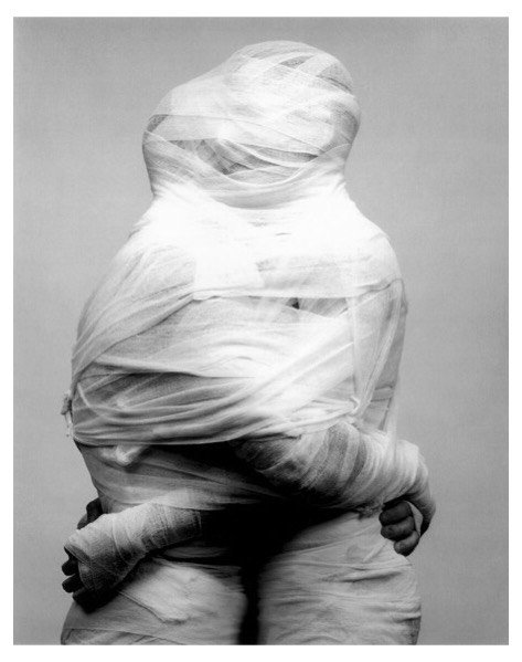 We're kicking off #PrideMonth with #RobertMapplethorpe 's "White Guaze" series. In this image a couple is encompassed in a web of white gauze. The gauze, both a tether and a shield, safeguards the intimate embrace of the racially and sexually ambiguous couple. #renniecollection