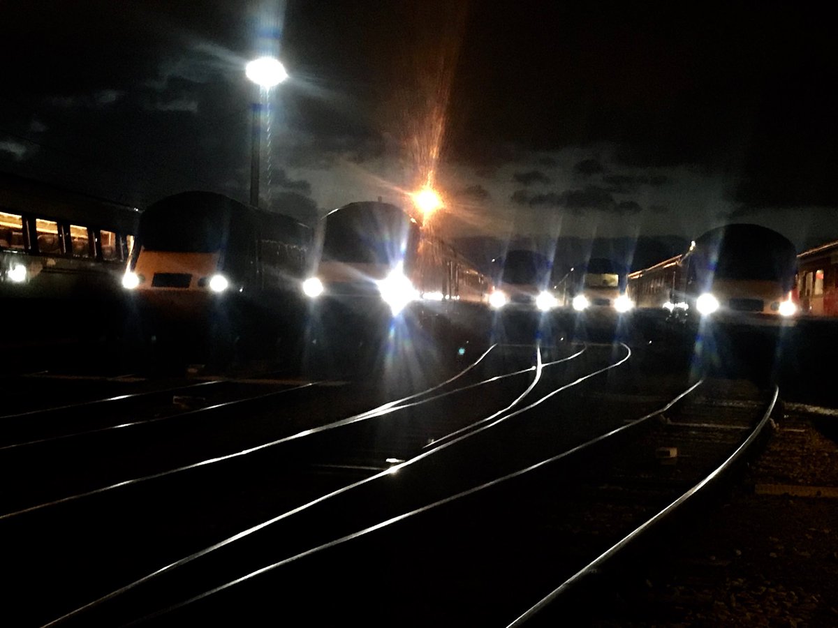 pacorrie's tweet photo. A scene soon to change 7 high speed trains sit awaiting their departure times marker lights pick out the railheads has dawn breaks #hst #dawn #railways #depot #readyfortheoff https://t.co/TBrxs9uTGq