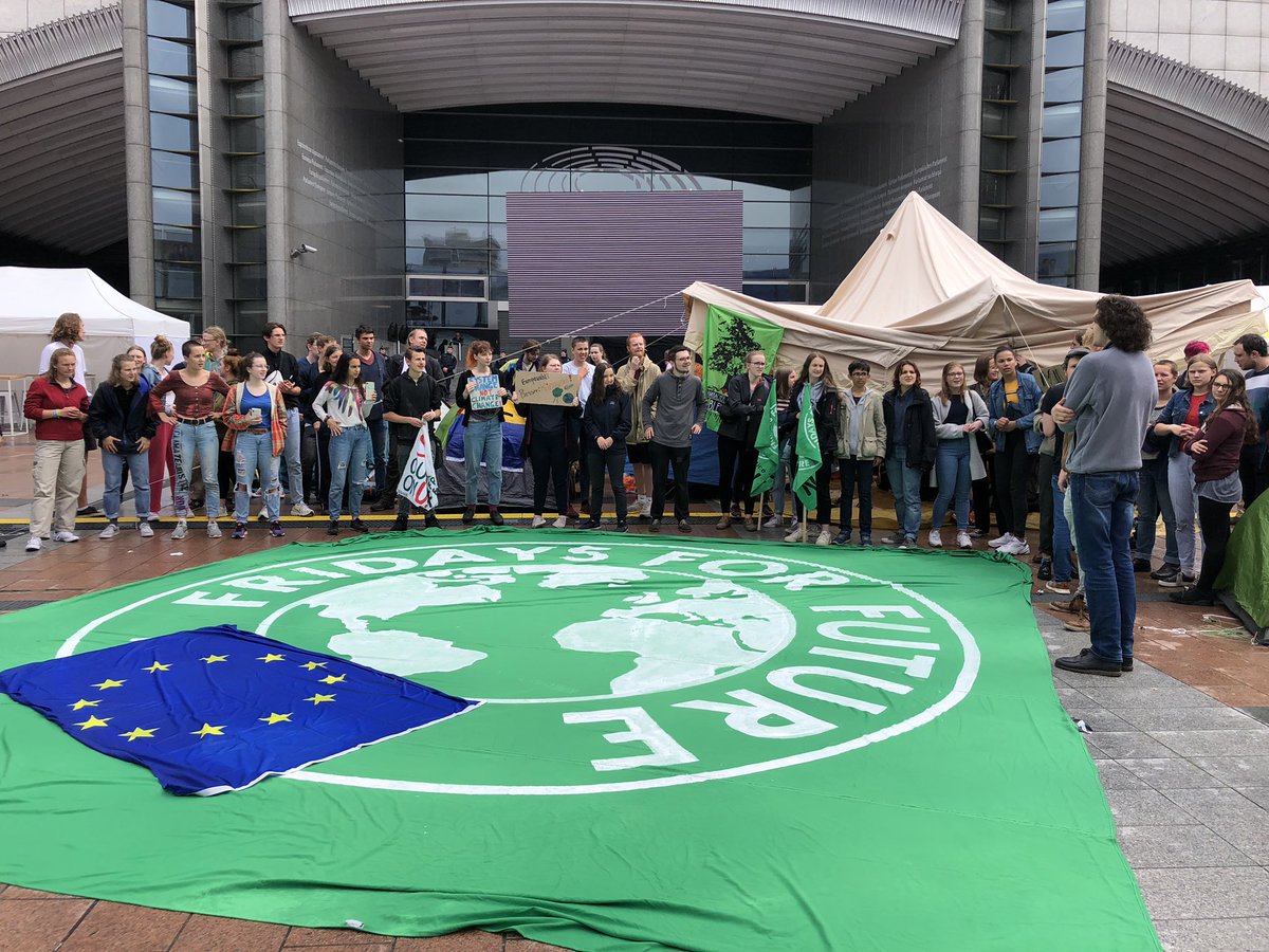 jakobblasel's tweet photo. The youth from all over Europe gathered in front of the european parliament to #occupyforclimate. We are demanding climate justice and asking you to #voteclimate https://t.co/08G65xYUuF