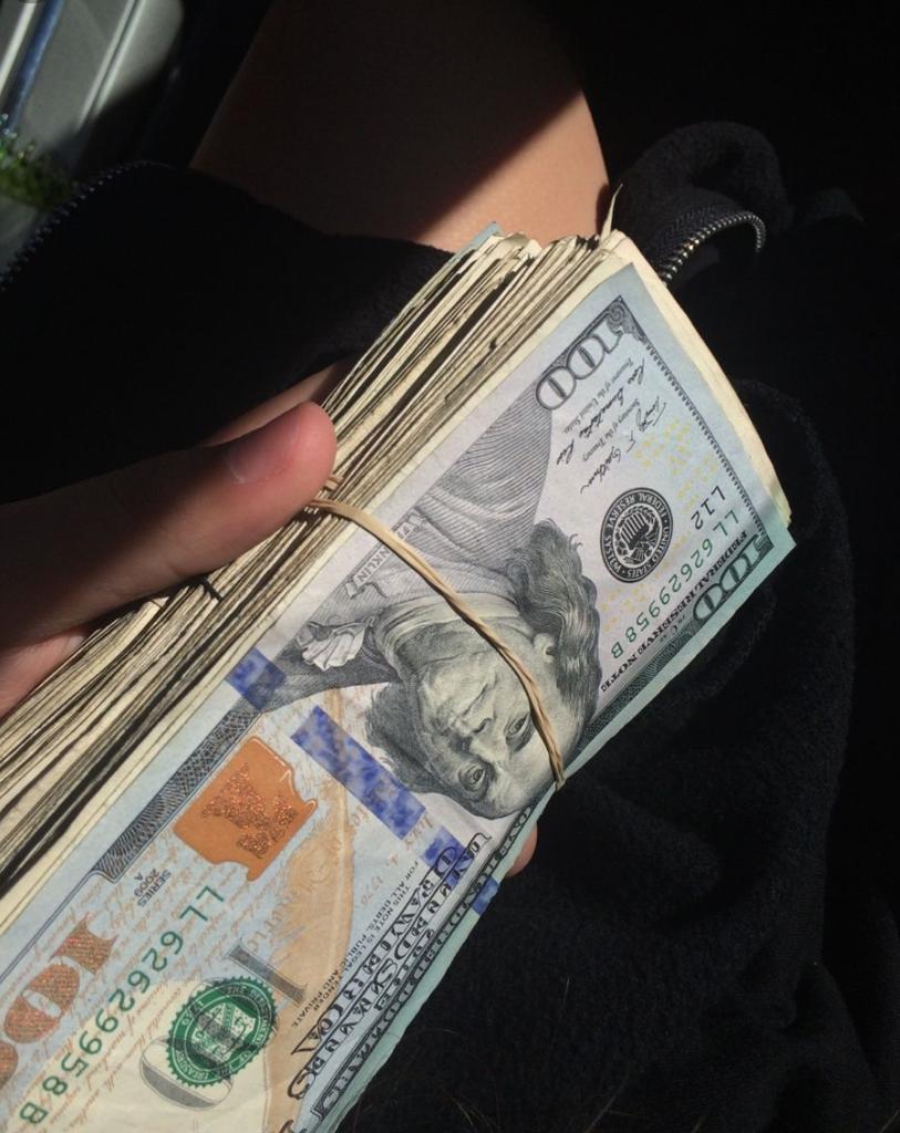 real money hood stacks of money