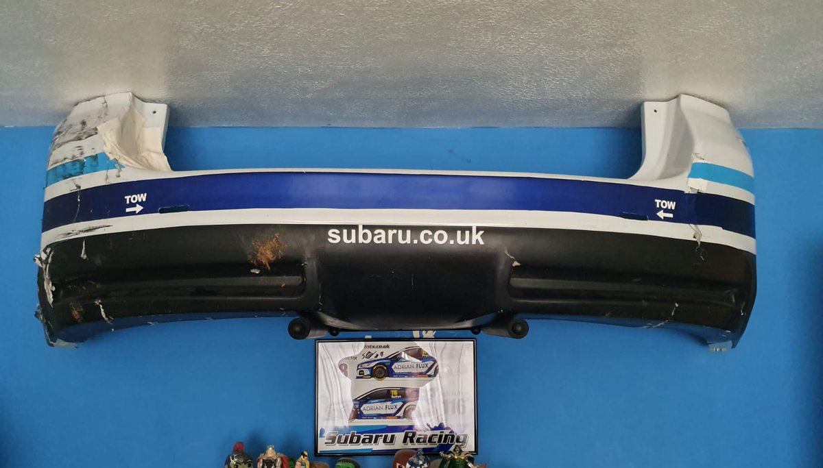 brettiusmaximus's tweet photo. So after @BTCC at thruxton,went got a bumper,got @ASuttonRacing to sign it,fun putting in car plus loads space on journey home. Finally up on brothers wall! @PaulONeill29 https://t.co/4bYZnet1LY