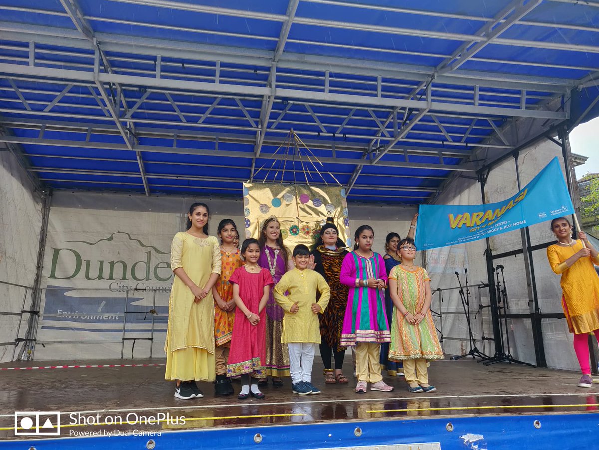 DudhopeCentre's tweet photo. Dudhope Multicultural Centre young people and their teachers at #dundeedesignparade today in the city centre. They build up a Shiva temple 😍 with recycled paper and CD and performed a new dance. https://t.co/cfCZHl3EuX