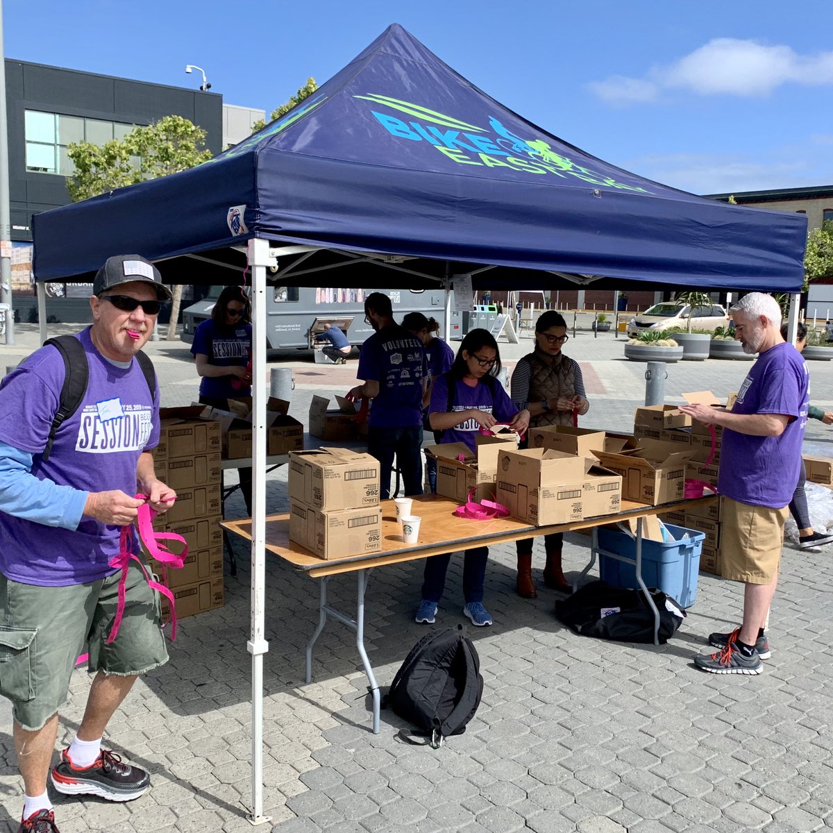 BikeEastBay's tweet photo. Volunteers prepping for #Sessionfest beer fest today at Jack London Square, 1-5pm. Proceeds benefitting @BikeEastBay. Thank you @DrakesBeer for organizing. See you this afternoon https://t.co/oSB0Ubbv6X