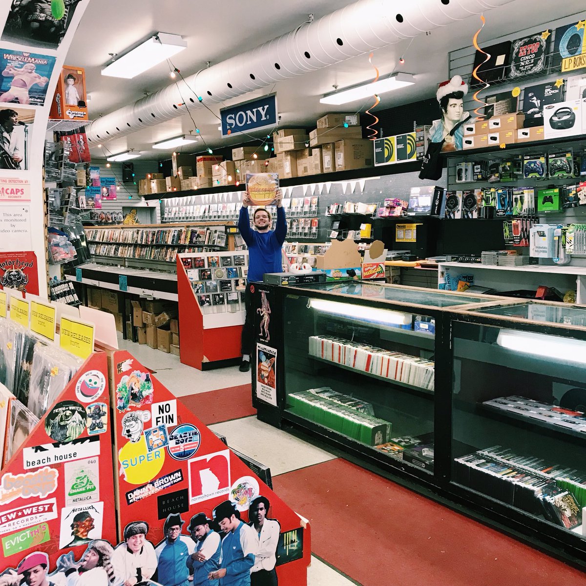 Luther is very far away, and very excited about the record he’s holding! It’s Stereolab’s reissue of Mars Audiac Quintet ~extended edition~ 
#cheapiesstaffpicks