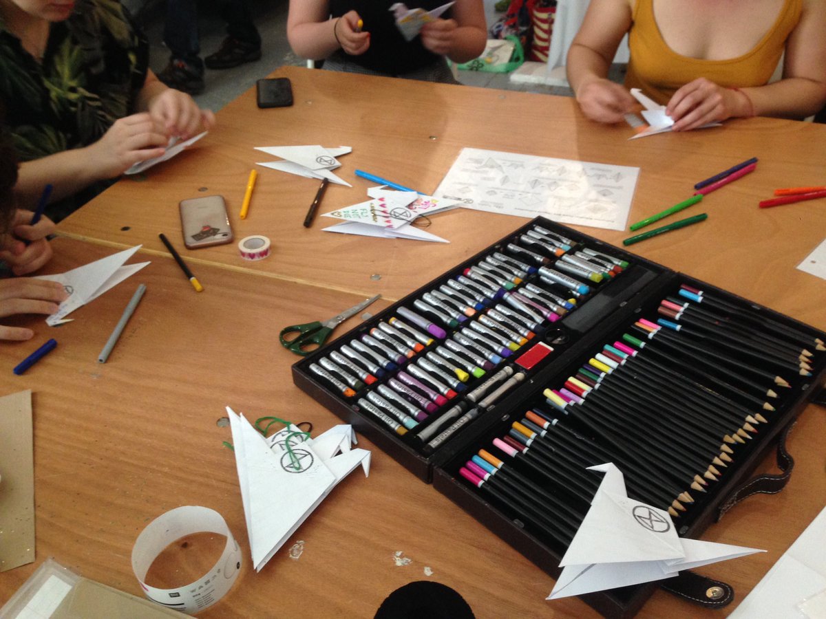 ChloeSwinton_'s tweet image. Wonderful #MessengerBirds workshop today at the XRT Festival in aid of @ExtinctionR. Love sharing my passion for making origami birds with others, especially when they are for a good cause. #extinctionrebellion #norwich @NorwichXr @UEAXR #climateemergency #1000PeaceBirds