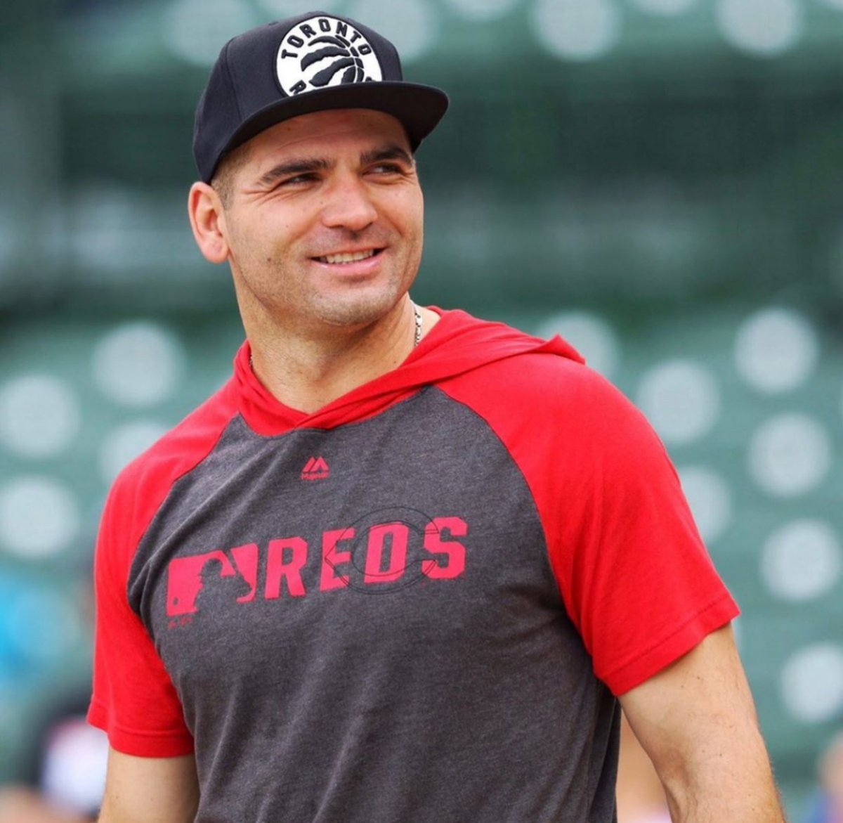 SeriousSportsCo's tweet photo. If Joey Votto wearing a @Raptors hat doesn't fire you up for tonight's game nothing will https://t.co/QlQpI122ZV