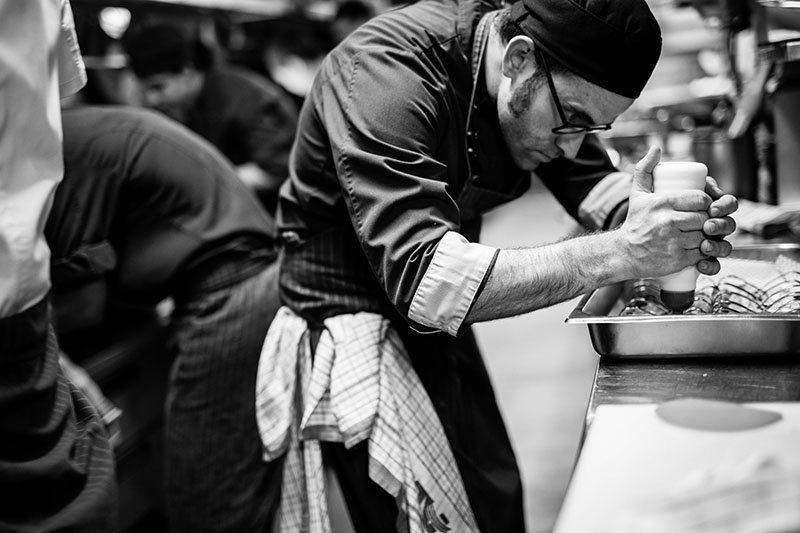 BACCHUSBrisbane's tweet photo. Bacchus 7PM - Final touches mid service. 

Our team of chefs thrive in the chaos of service. Every night they work tirelessly to ensure that our guests can enjoy the best. https://t.co/fngaV8jwUl