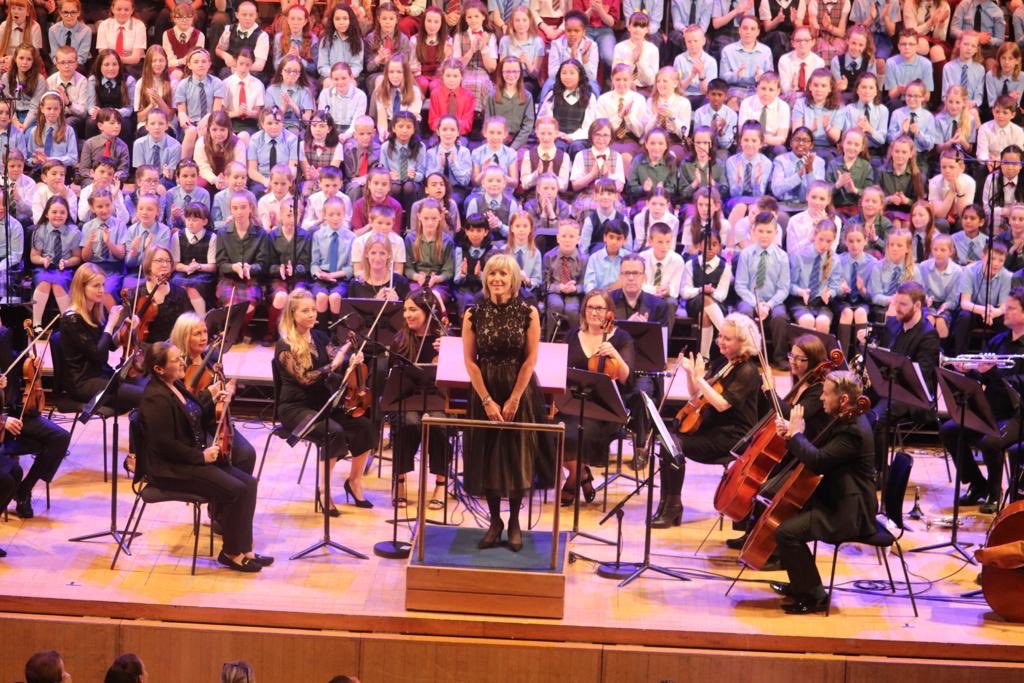 TeachingCouncil's tweet photo. Over 9,000 children, 139 schools, over 450 teachers in 2019 - what a phenomenon the @ChoirNCC is! Congratulations to all #teachers, parents and students - singing and music of the highest quality last night in first of 3 concerts. #Teachers, take a bow! #edchatie @NCH_Music https://t.co/ole3XAFkMD