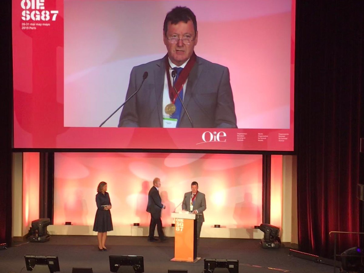 HinderNicola's tweet photo. Dr Trevor Drew, Director of Australia’s Animal Health Laboratory accepting the OIE Gold Medal today - the OIE’s highest honor. It’s the 2nd time in 2 years that 🇦🇺’s animal health system has been recognised by the OIE. We play a key part in driving the 🌎’s animal health system. https://t.co/AS9j8Zqq2N
