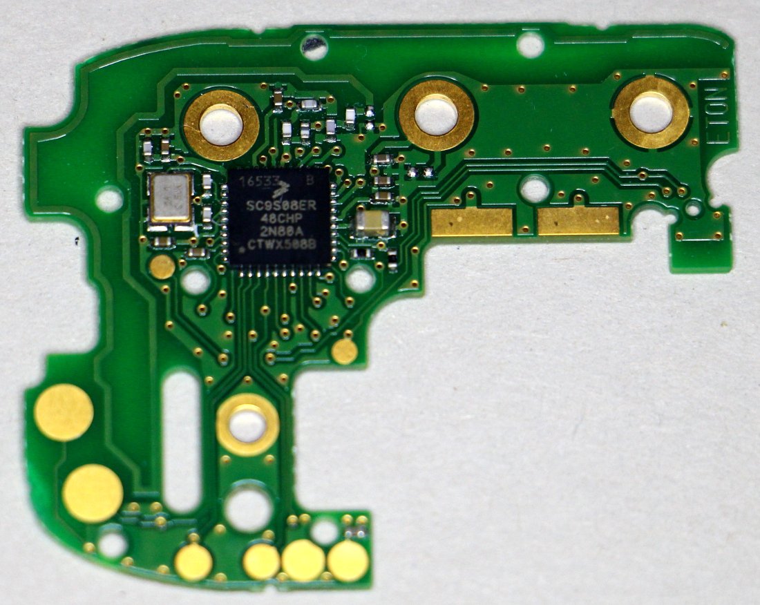 The small circuit board for the Omnipod contains a SC9S08ER microcontroller, in the Freescale S08 family, along with a few tiny surface mount components: crystal, resistors, capacitors.