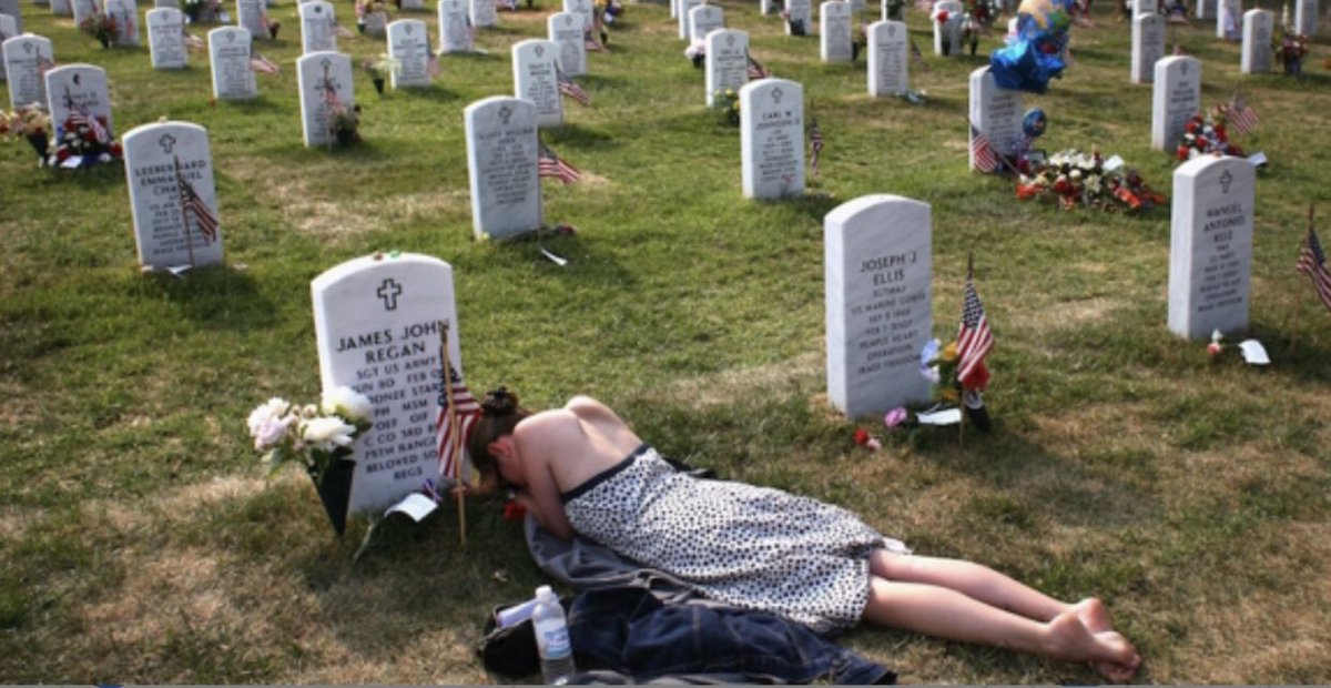 This young ladies fiancé was killed in Iraq by a roadside bomb. While Memorial day means going to the beach or eating barbecue for some, others spend it like this. Our soldiers have made this the greatest country in the world, period! Remember tomorrow is to honor our FALLEN men!