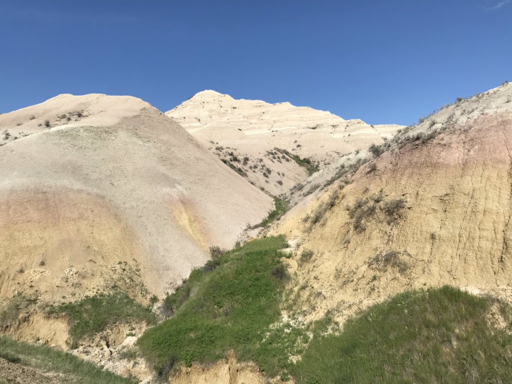 aedancjames's tweet photo. Shout out to the guy I hiked past in the bad lands who exclaimed with defeat “I’m tired of these majestic landscapes” while surrounded by this: https://t.co/DwOf7MKksz