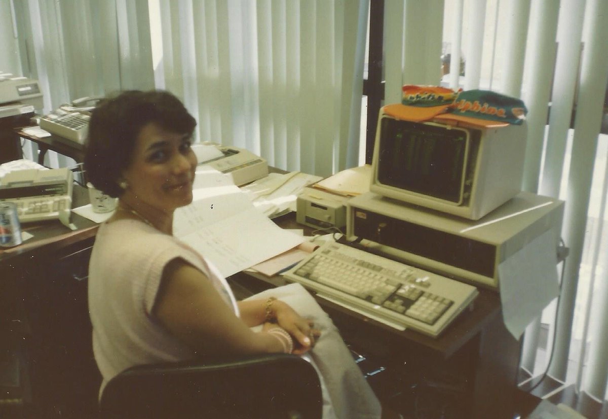 OR_Colan's tweet photo. #50factsfor50weeks - Cathy Colan Muth, our CEO, started as the editor for the courses her father developed in the 1970s and became ORC’s computer programmer during the 1980s.  She is pictured here with a computer from that era. #orcolan #50yearsoforc #orc50 https://t.co/6aaJUDmeeO