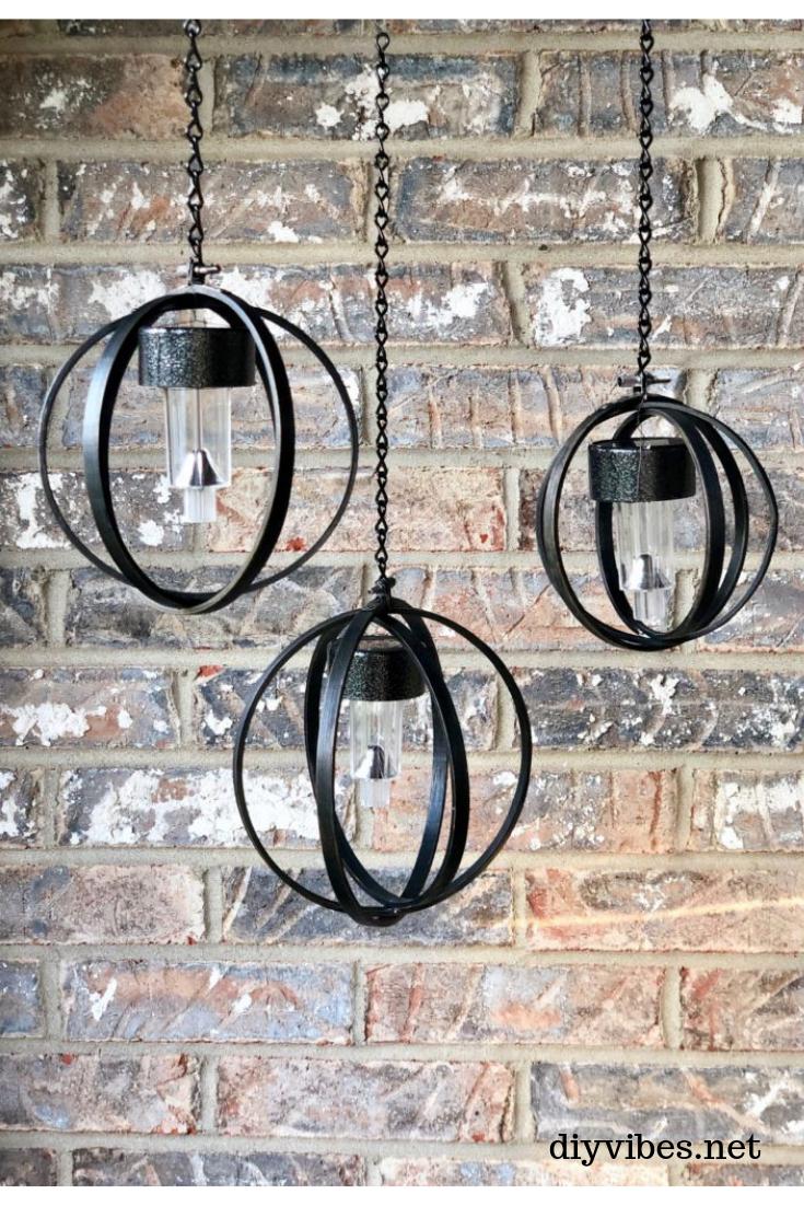 Learn how to make these DIY hanging solar lights! Perfect for summer! #diy diyvibes.net/diy-hanging-so…