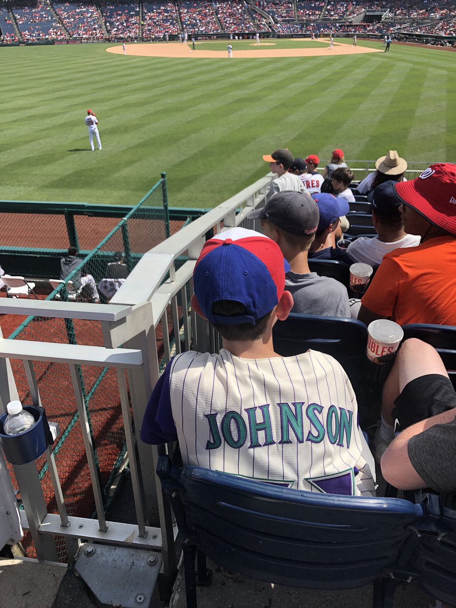 Jarsenault's tweet image. Digging this kid’s old-school style, since he probably wasn’t around for either of these entities. #BigUnit #Expos