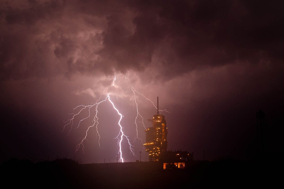 Key differences between rockets & planes:Rockets punch vertically through cloud layers, and rockets trail ionized exhaust connecting them to ground.Both of these make lightning strikes more likely.And “should be fine” still carries a risk. Thus: weather scrubs.