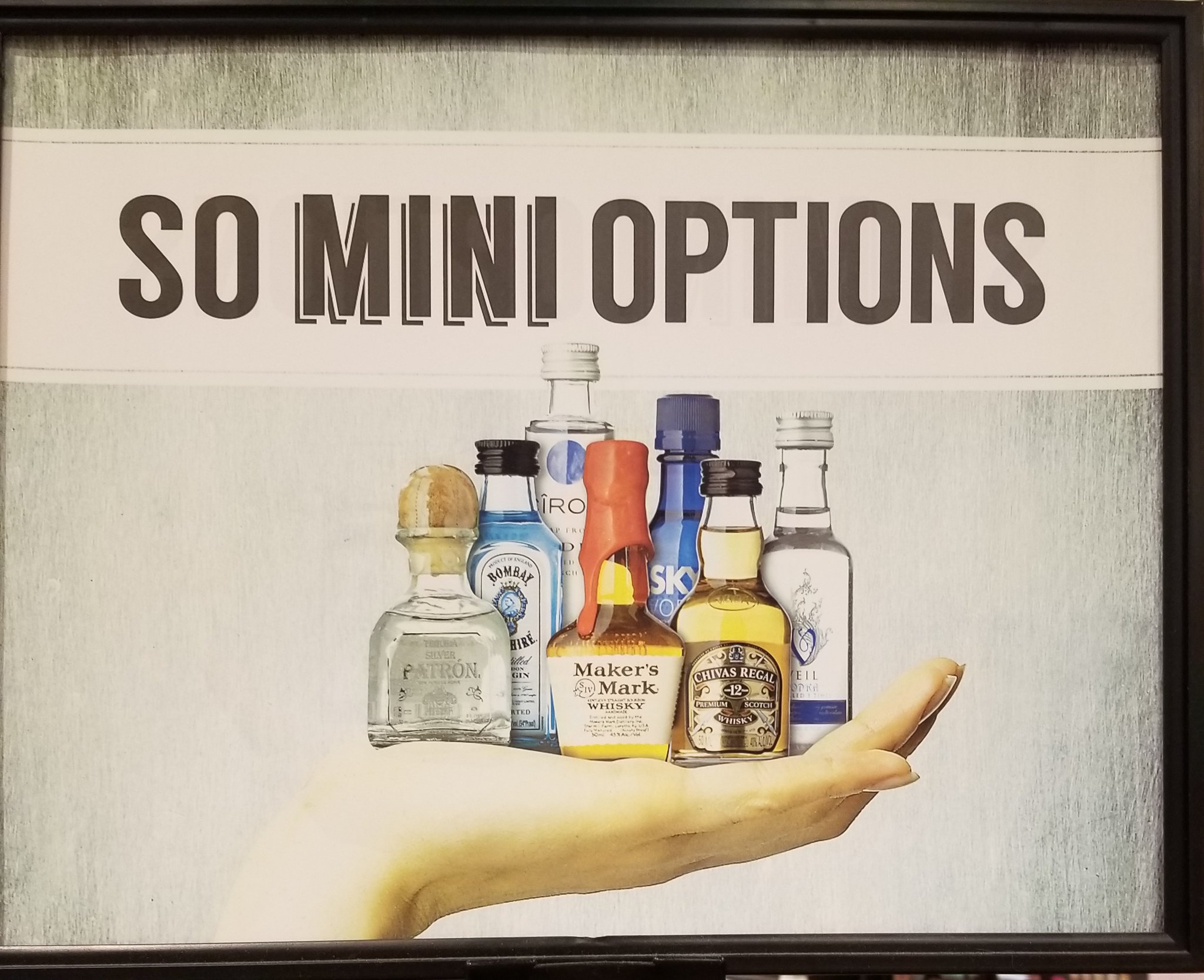 an image of a hand holding small liquors with the text saying So Mini Options