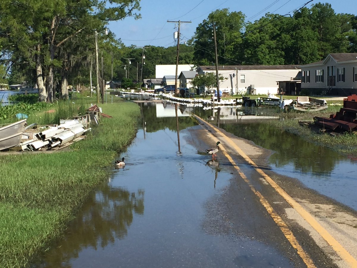 JayGrymes_WX's tweet photo. Some additional highwater pics from Pierre Part .. taken Sunday, May 26.
(1) Tiger Dams on Lee Dr
(2) water on Bankers Ct
(3) sandbagging along South Bay Road
#AssumptionParish
#LAwx https://t.co/BpVa320OjJ
