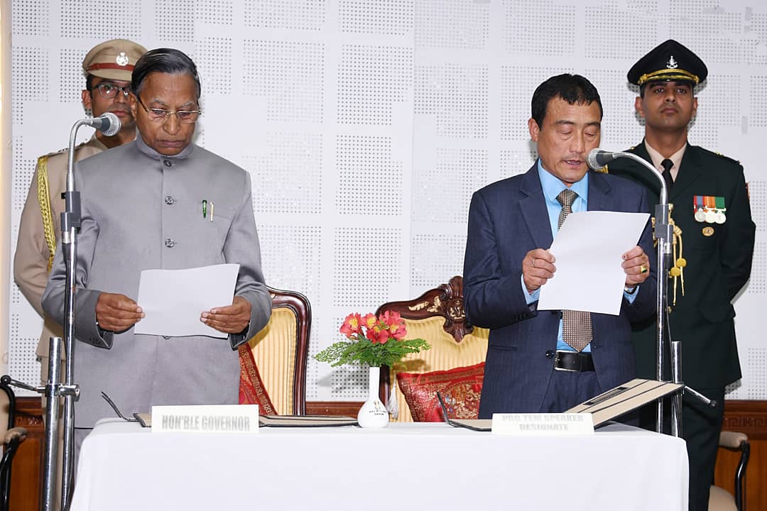 24_sikkim's tweet photo. SHRI SANGAY LEPCHA SWORN-IN AS THE PRO TEM SPEAKER TODAY AT RAJ BHAWAN.

MLA Shri Sangay Lepcha from Yuksam Tashiding Constituency was administered Oath of office as the Pro Tem Speaker for Sikkim Legislative Assembly by the Governor Shri Ganga Prasad today at New Raj Bhawan. https://t.co/HDREDJQFTG