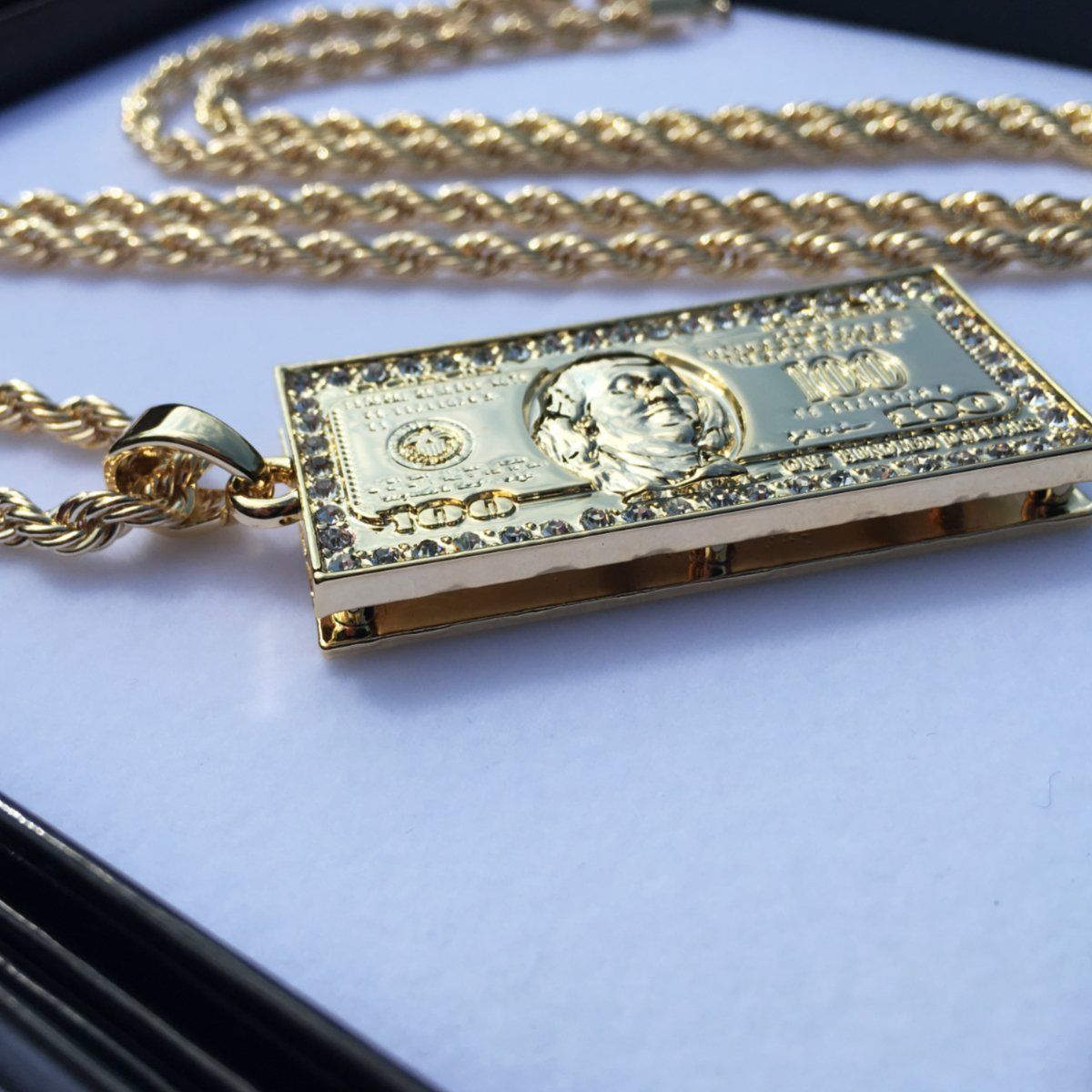 Sell4Profit's tweet photo. PVD Gold Iced Out Bling Benjamin Franklin Hundred Dollar Bill 3D Pendant Necklace accented with Diamonds on edges #jewellery #goldplated
£5.45
➤ https://t.co/ph4bbiPGRD https://t.co/olo7Y2MOth