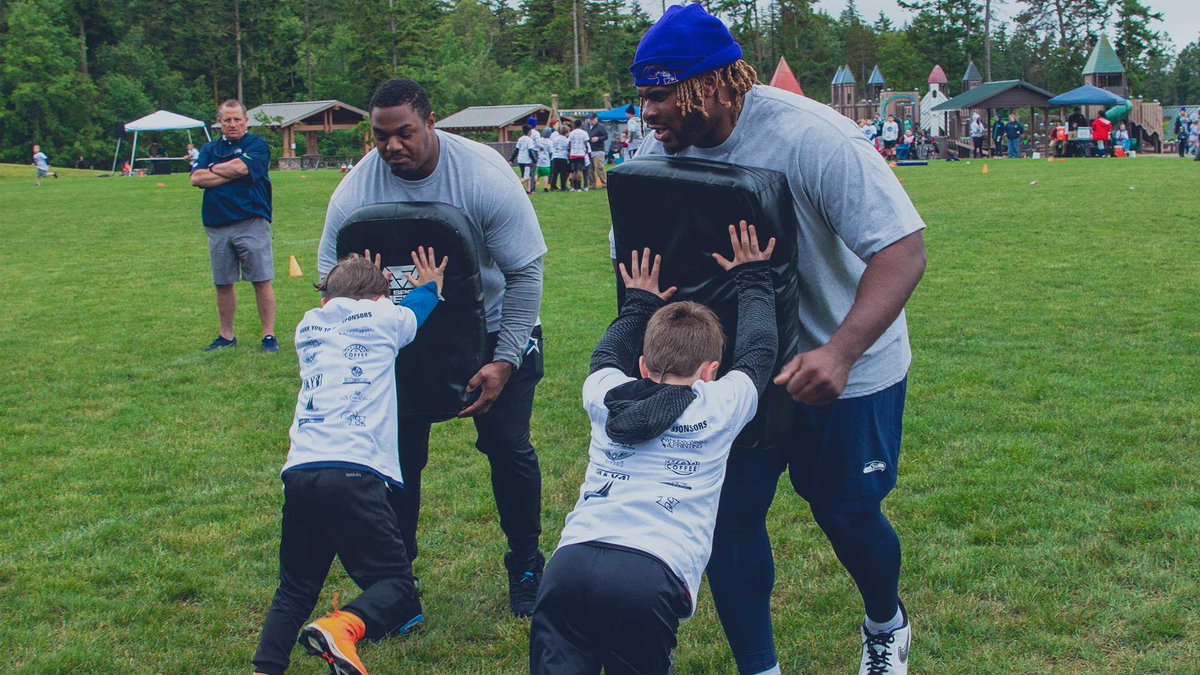 Seahawks's tweet photo. .@DJTheWarrior76 hosted a free youth football camp over the weekend and helped over 250 kids put in work! 💪 https://t.co/8XZghOD7Xa