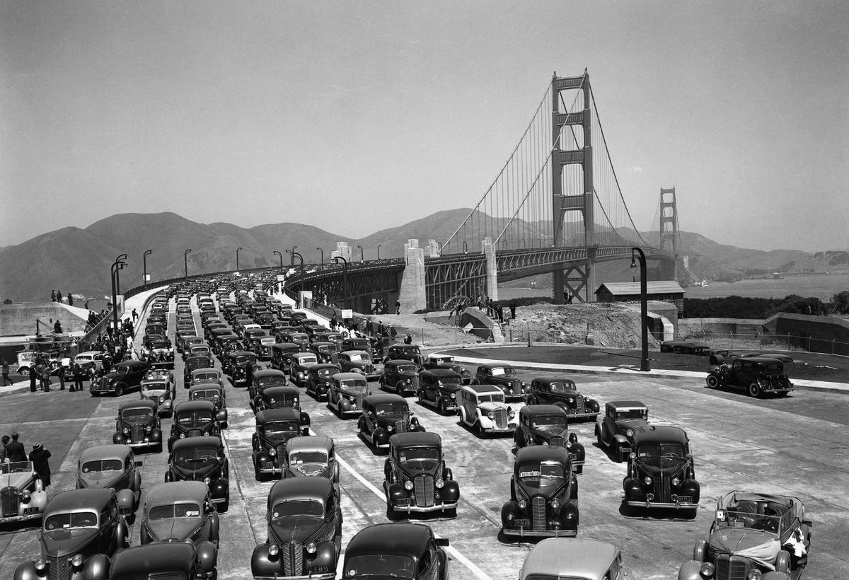 GGBridge's tweet photo. On this day in 1937, the #GGB opened to vehicular traffic. President Franklin D. Roosevelt announced the event to the world from the White House. Every fire siren in #SF and #Marin sounded, every church bell rang, every fog horn blew, and ships sounded their whistles. https://t.co/p8Aa7YIS7j