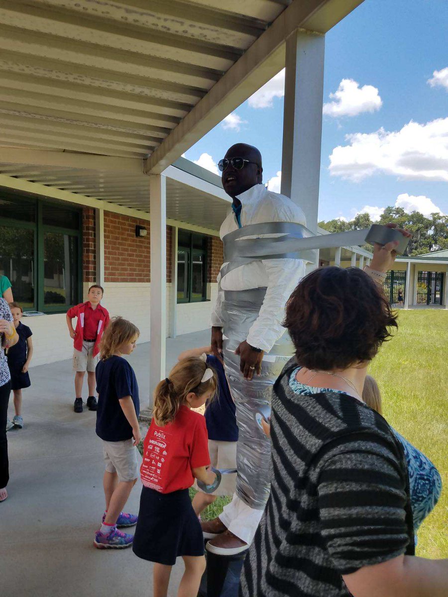 hgeheroes's tweet photo. It's not every day that you get to tape your principal and assistant principal to a pole! Congrats to our students that earned this PBS reward! @duvalbault94  #hgeheroes #lovepolkschools #allsmiles https://t.co/1Jq2FVpkXo