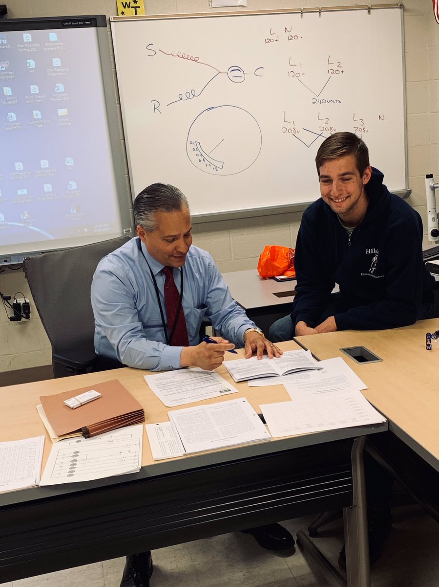 CTTechHS's tweet photo. #WilcoxTech student Tyler Hamelin smiles as Paul Femia from the @CTDOL registers him for an #HVAC apprenticeship! Congrats Tyler! #cte #ctjobs https://t.co/yCNXUgS2Np