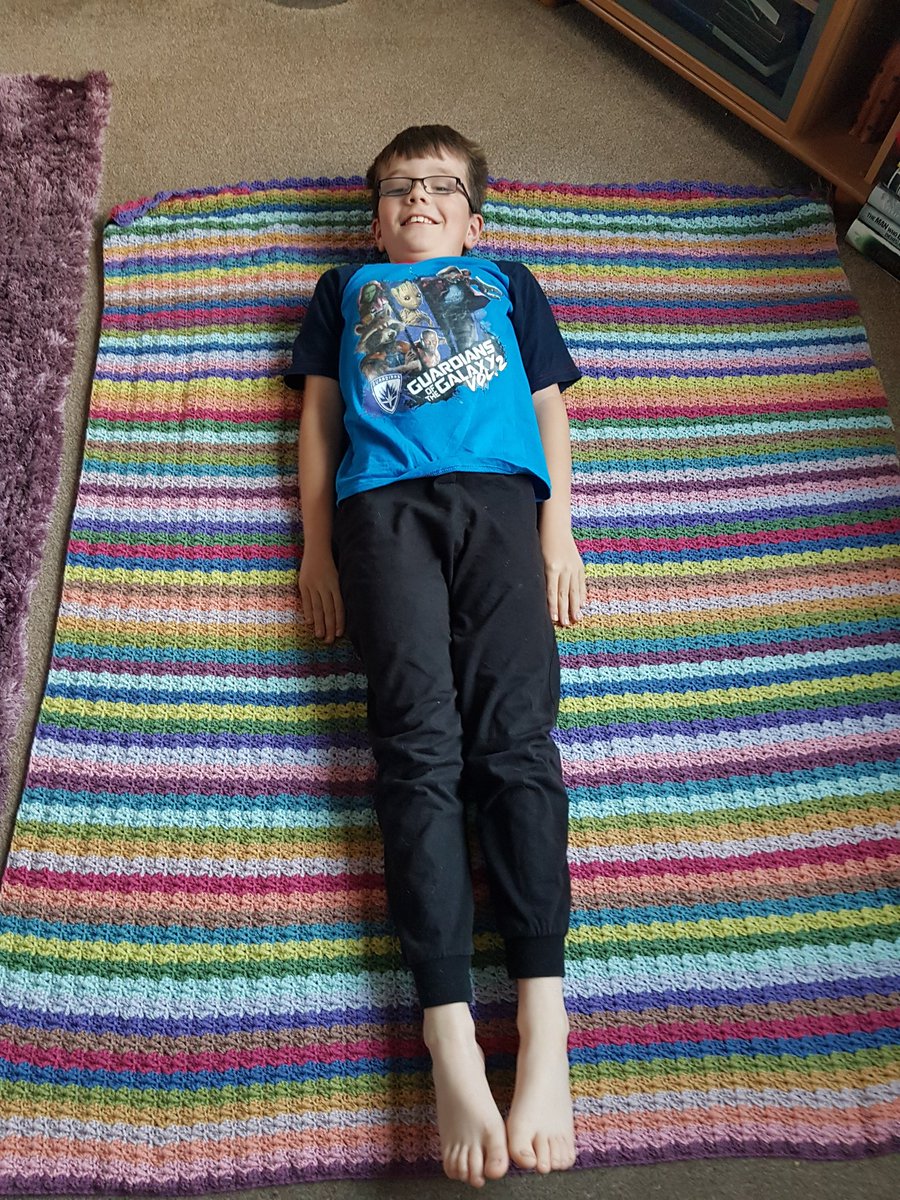 leo181711's tweet photo. Using almost 11yr old child for scale of this blanket! #Attic24 #HydrangeaBlanket 

Quick calculation *if* I were to sell (I won't!) I'd be asking £80 for this blanket, that would cover the cost of the materials and the time I've spent making it! https://t.co/GYX5FZ2eny