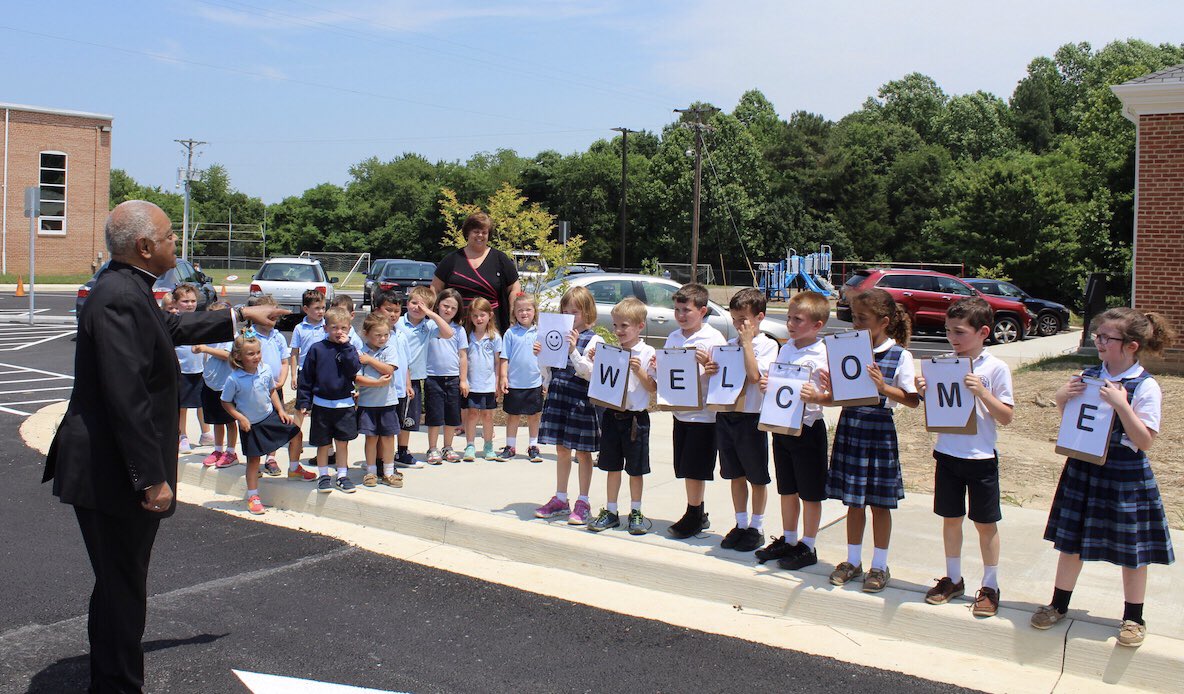 hmfrancisco's tweet photo. @FAWcrusaders 1st gr and PK Ss took a break from the playground at recess today to greet Archbishop Gregory as he arrived for a meeting with SoMD priests @staloysius20650 @WashArchdiocese #ADWSaints https://t.co/RsNxluLokU