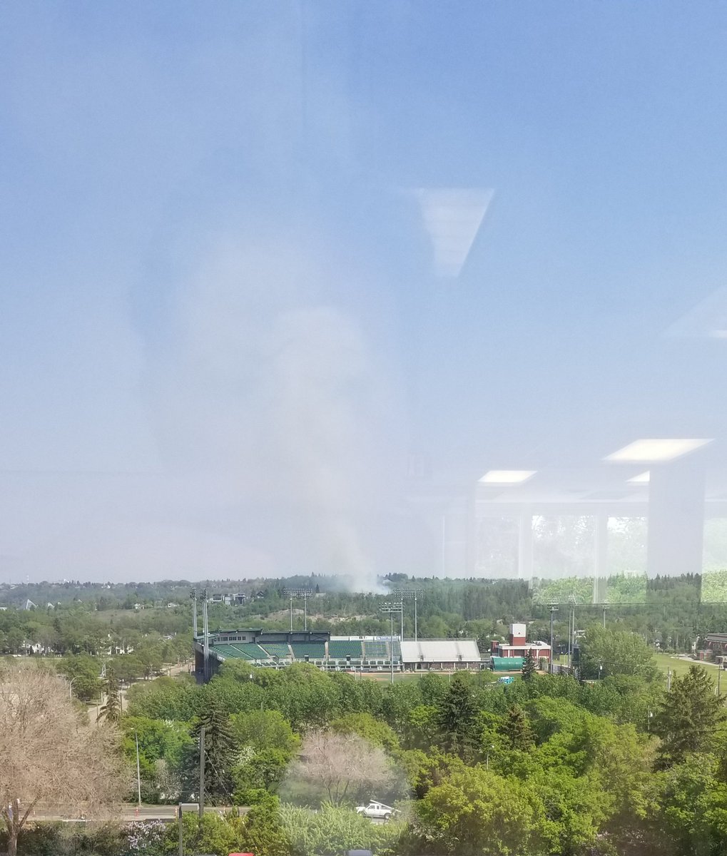 Does anyone know what is burning over by 99st / Sask Drive? Lots of smoke in the river valley. #yeg #fire