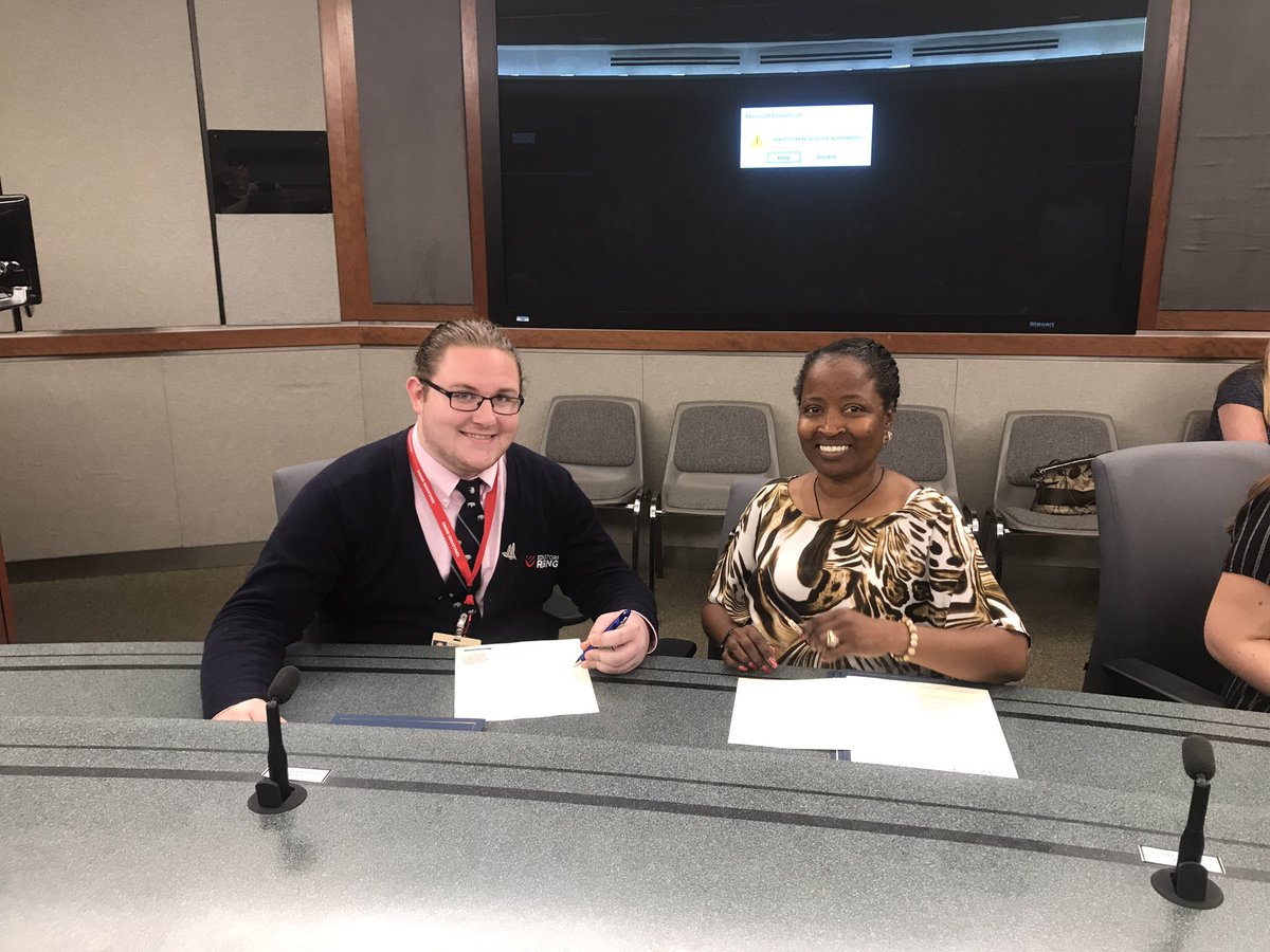 THSFutureTchrs's tweet photo. These two Future Teacher Award winners signed their contracts tonight and are now employed with VBCPS upping college graduation! #LionsAmazing #FTAW @VBCPS_HR https://t.co/skPrOf3JoR