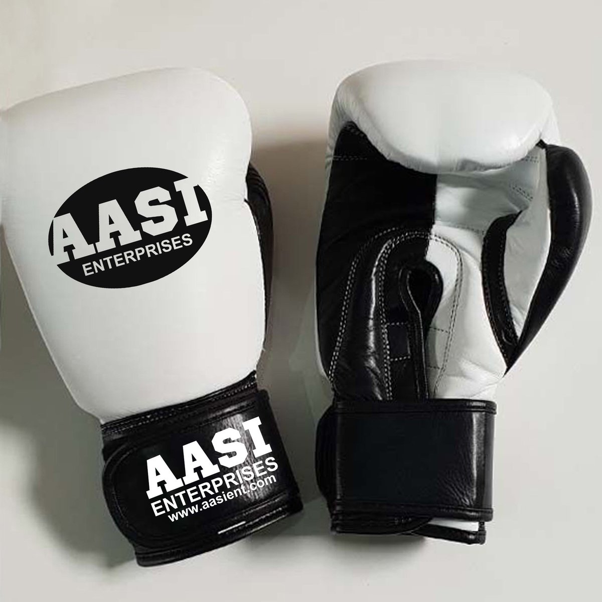 AASIENTERPRISES's tweet photo. white and black boxing gloves https://t.co/oPO5sTDbx3