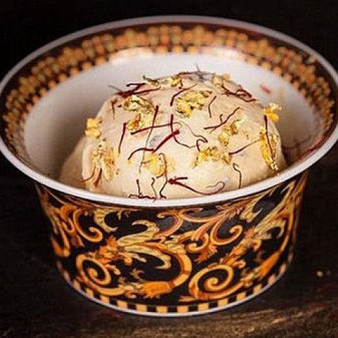 FoodDood4's tweet photo. Considered the world's most expensive ice-cream, a scoop of Dubai's 'Black Diamond' costs upwards of $800.

Eaten with a Versace spoon, it is decadence embodied and contains 23-carat edible gold sprinkles, black Italian truffles, and Iranian saffron.

#FoodFact #IceCream #Dubai https://t.co/uHlqY7R9o8