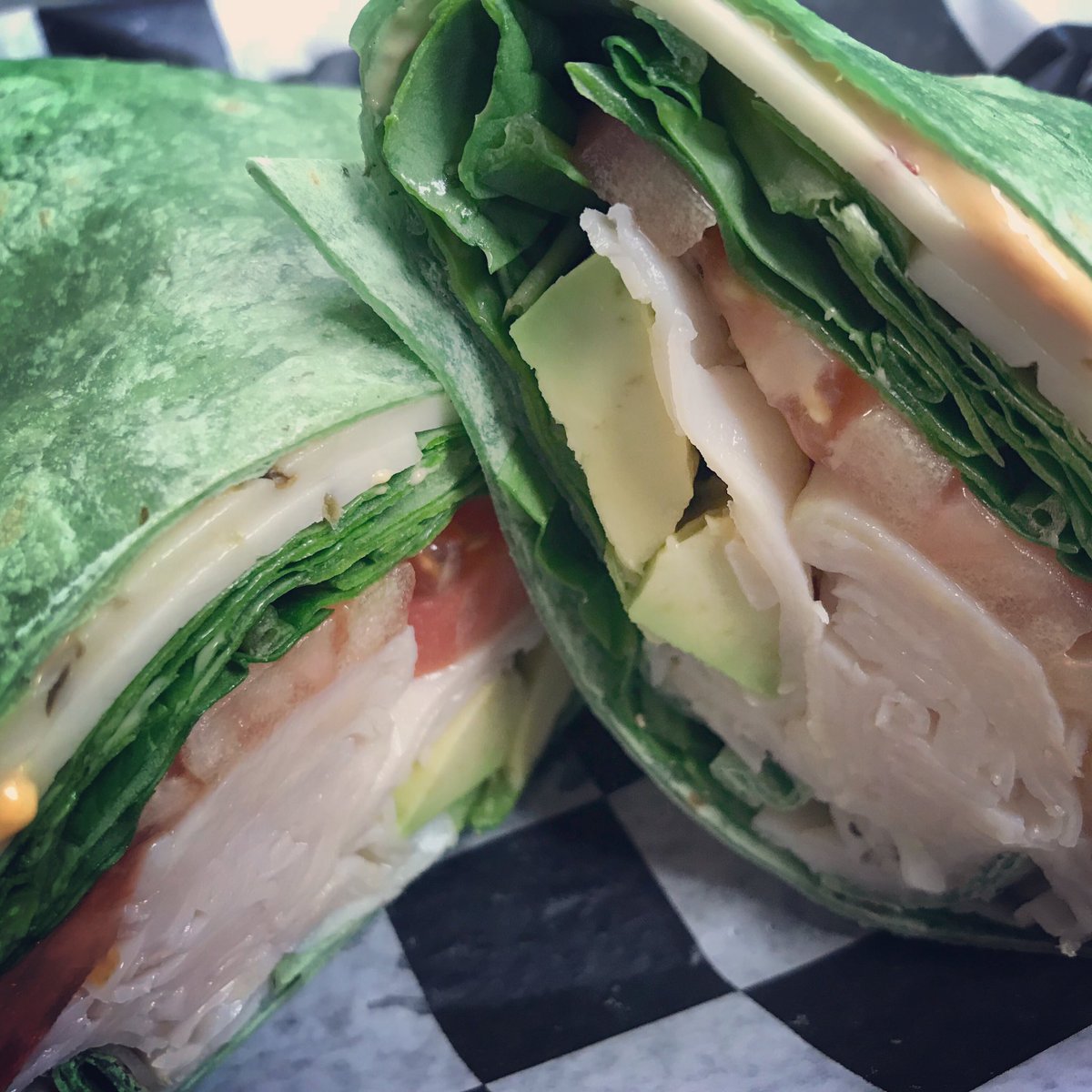Turkey Jack Wrap ~ turkey, pepper jack cheese, tomato, avocado, baby spinach, mayo with salt and pepper.  Kick it up and ask for chipotle mayo instead!