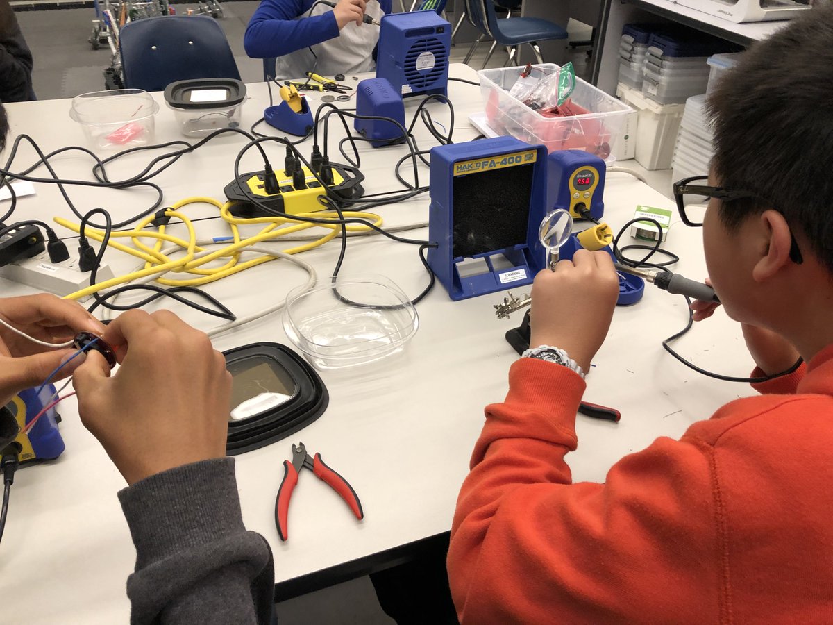k_debest's tweet photo. Students learn to wire and program with Arduino in my engineering elective. Every student is also learning to solder and we had some students from the Algalita elective join us to solder their underwater robot. Love teamwork! @PegasusSchool @Algalita https://t.co/PjHeue8TE2