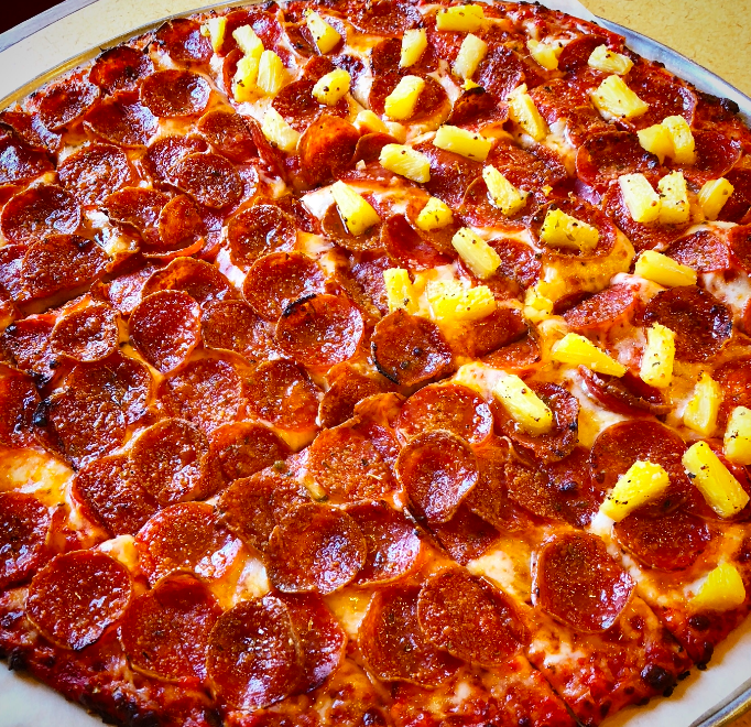 Donatos's tweet photo. What's your stance on pizza and pineapple? 🍍🍕 https://t.co/5tOozsWlVa