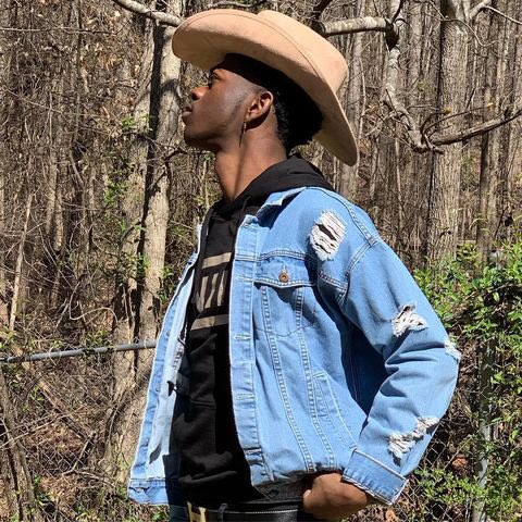 GoGirt's tweet photo. @_therealsantos Yo you better be getting some 💰💰💰 from @LilNasX  for giving him his style haha https://t.co/BMVxXidABL