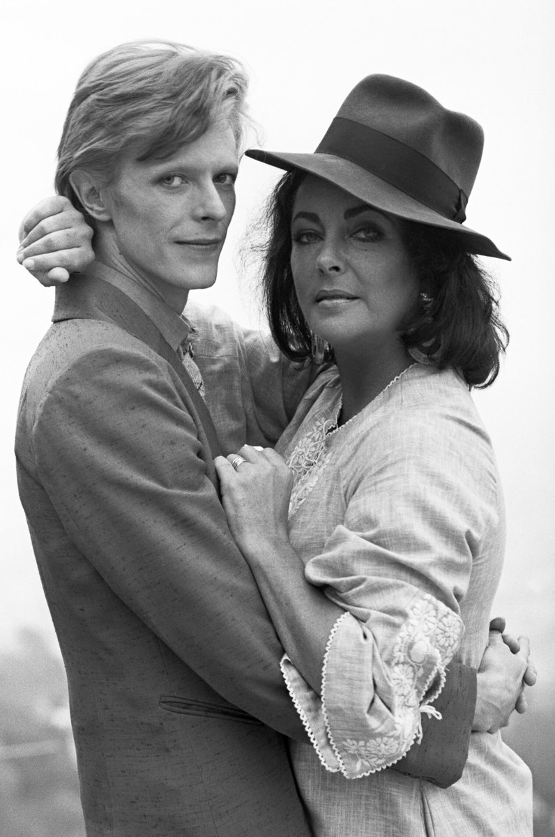 CheNirvana's tweet photo. The 'thin white duke' with Betty Taylor in America circa late '74 early '75.

Bowie looks fucked because he was whacked on charlie at the time but Liz looks great.

#KillingEverything
#ImThinkingThatItMustBeLove https://t.co/hqMmZf9SpO