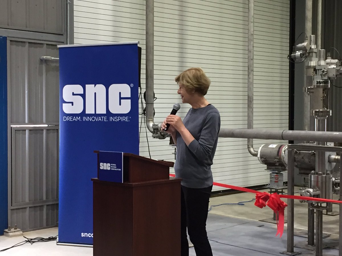 SierraNevCorp's tweet photo. SNC’s facility outside of Madison, WI couldn’t have been built without the help of @SenatorBaldwin. Our CEO, Fatih Ozmen, was thrilled to welcome her for with the ribbon-cutting ceremony today. https://t.co/1mTlpnFWjo