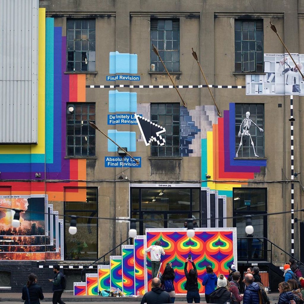 kazzrita's tweet photo. A Mural of Swirling Cursors, Dancing Skeletons, and Rainbow Hearts is Set in Motion When Viewed Through a “GIF-fiti” App https://t.co/dw1C3GbGbW https://t.co/MXozHcVgXr