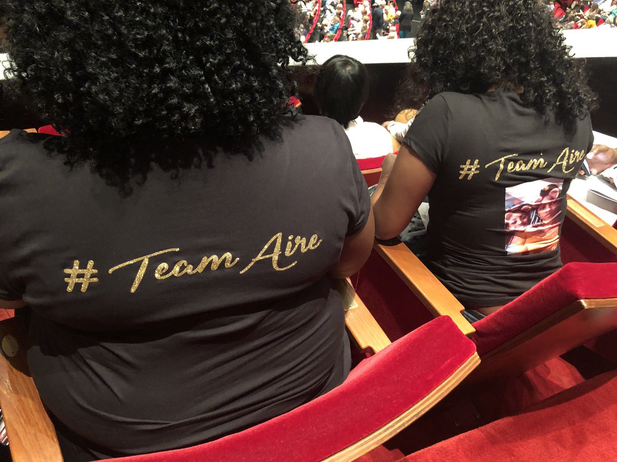 HoustonISD's tweet photo. More family t-shirts spotted in the audience! #TeamAire is in the house for @HSPVA 2019 Graduation 🎓 Ceremony! Tune in LIVE at https://t.co/gxj79KBuWi or on https://t.co/OSLfgz6Kke. #MyGraduationLive #HISDGradStories #HISDEmpowers https://t.co/12dtLU1b8O