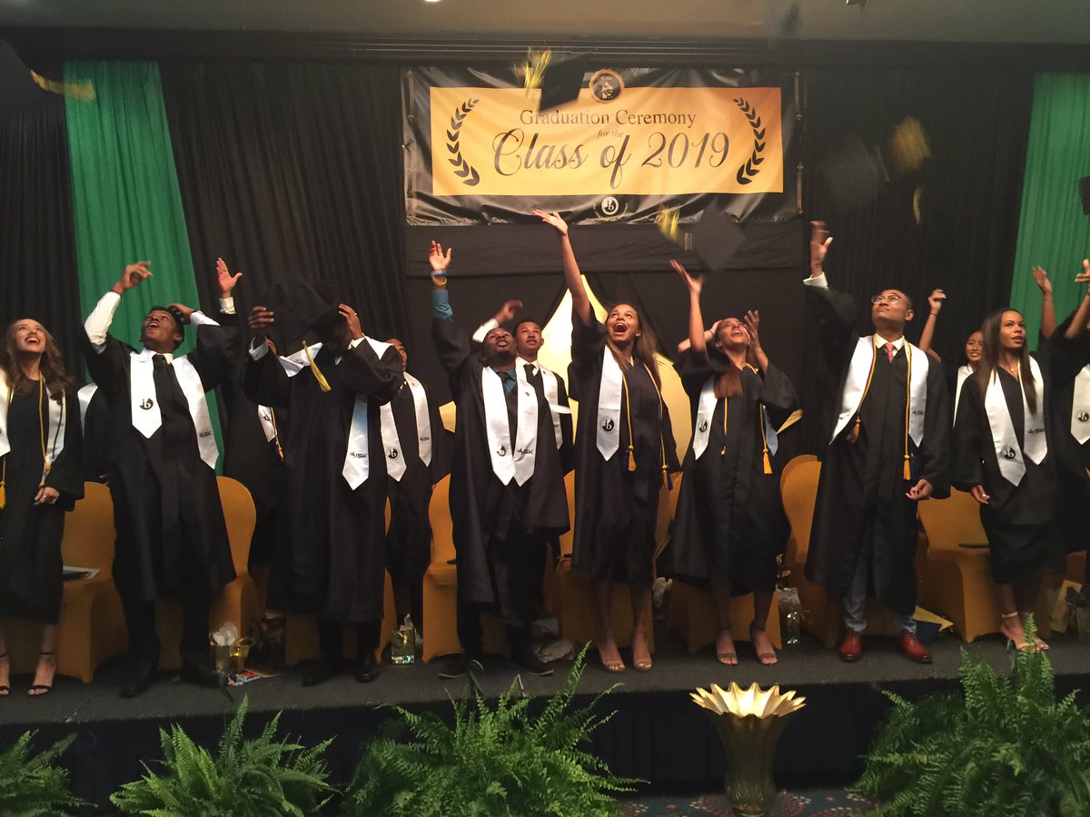 With the cap toss....it’s official! We have got AISK graduates in the house!#AISK #AISKjamaica