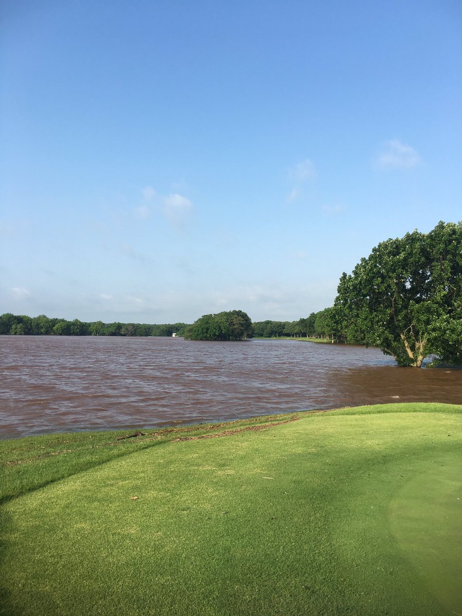 The view standing on 16 green, looking down 17 fairway, lake is 14 feet above normal