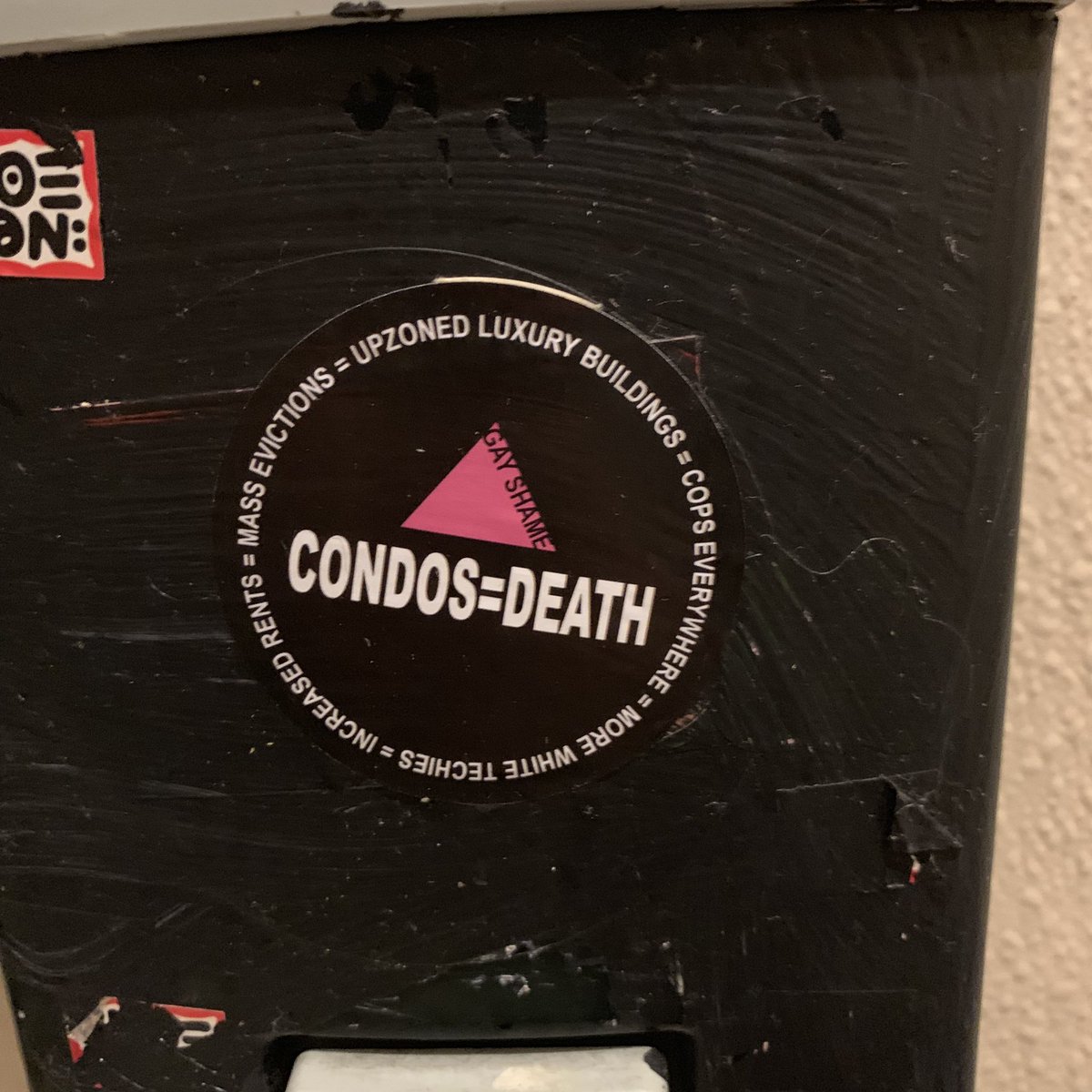 “Condos=Death” sticker on the style of the “Silence=Death” AIDS campaign