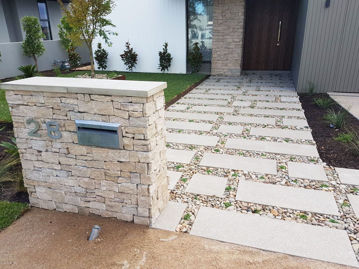 What a unique front walkway by the team at Maroondah Landscapes, using mixed #pebbles and our Pebble Range pavers in Alloy.

We're enjoying this pebble+Pebble combo 😄

#beautifulproducts #architecturalconcrete #walkway #pavers