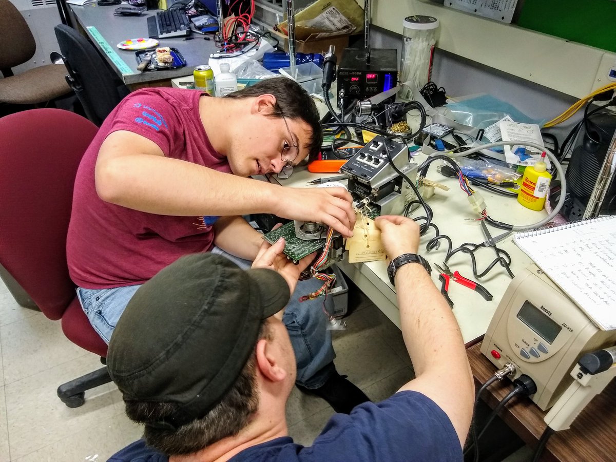 tastytronic's tweet photo. Our newest team member, Matthew Singer, and @JulianNowaczek are working on getting our #asr33 teletype online. It uses a rare ComData Corporation modem / psu / call control unit. #pdp12 #pdpcamp #retrocomputing https://t.co/hq08fTSDbD