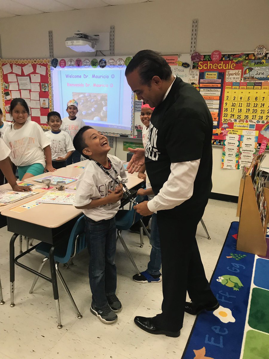 OaksideAwesome's tweet photo. Mrs. Lynch’s 3rd grd #DualLanguage class received a visit from @DrDavidMauricio. He assisted w/ completing their “Big 5 Rocks” project. The students presented him w/a #thankyou gift, a “BElieve in YOUrself” shirt which, he wore proudly. #peekskillpride https://t.co/QtXAK4BxU0