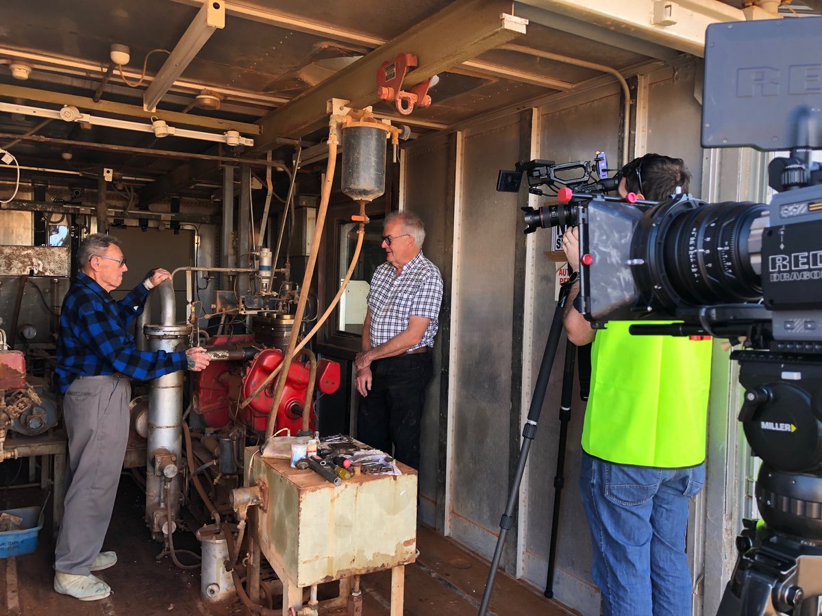 DavidDubbo's tweet photo. On set at the White Cliffs Solar Thermal Power Station. Shooting 2 films. First for the community about the first commercial Solar Thermal Power Station in the world. Here Bill Finney shows Graeme Hanigan how the steam Lister engine generated power for the community. https://t.co/FRpbpnZbc5
